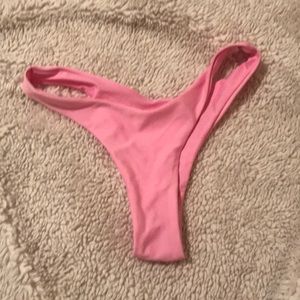 Thong bikini bottom size L never been worn